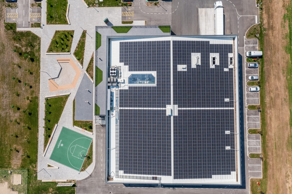 Look back at 2023 - birdview of Modepacks factory roof covered with solar panels